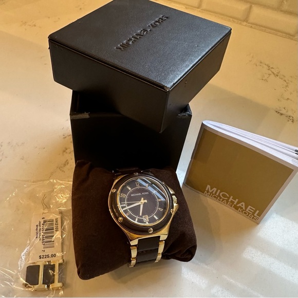 Michael kors watch. Gold and chocolate brown.